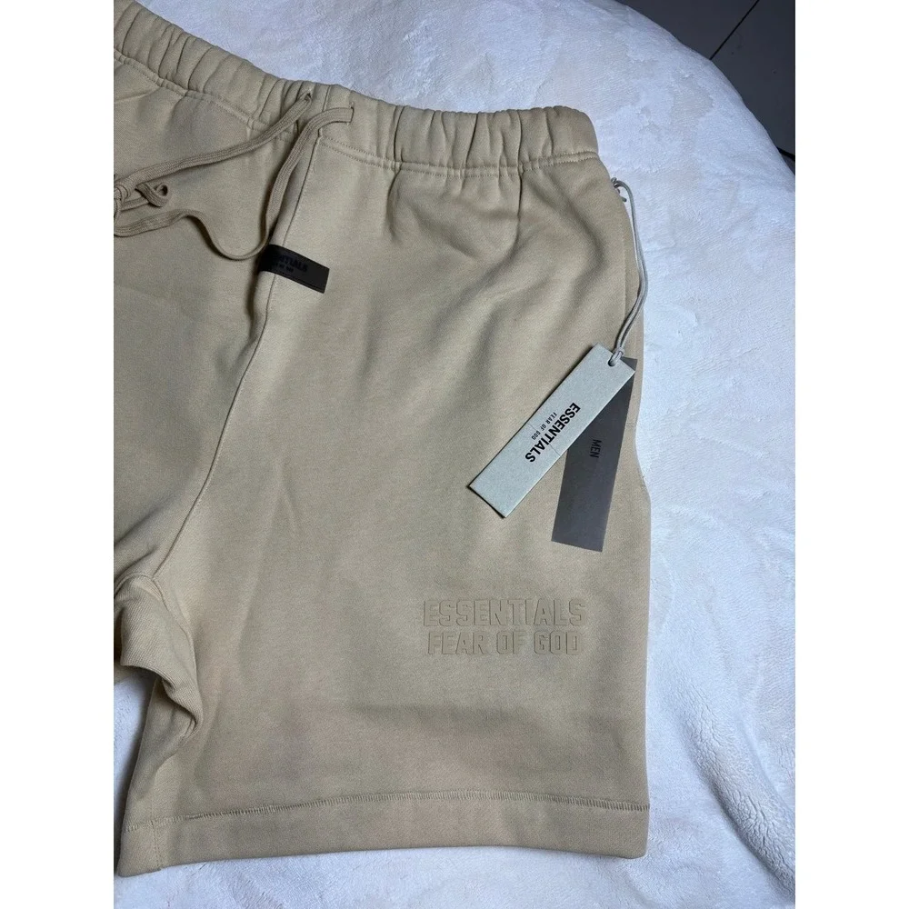 Men's medium Fear of God Essentials baggy sand colored sweat shorts. NEW.